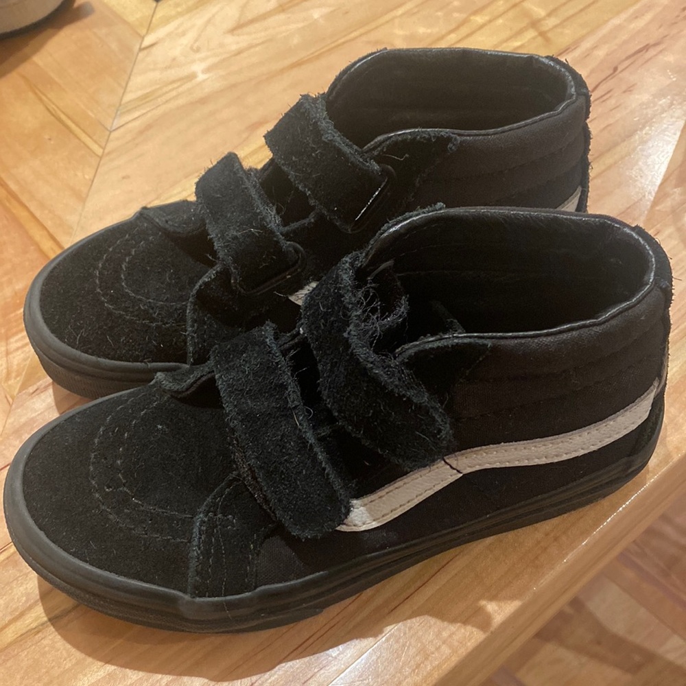 Boys Black Vans mid top sneakers